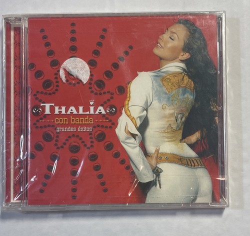 Thalia con banda grandes - con,